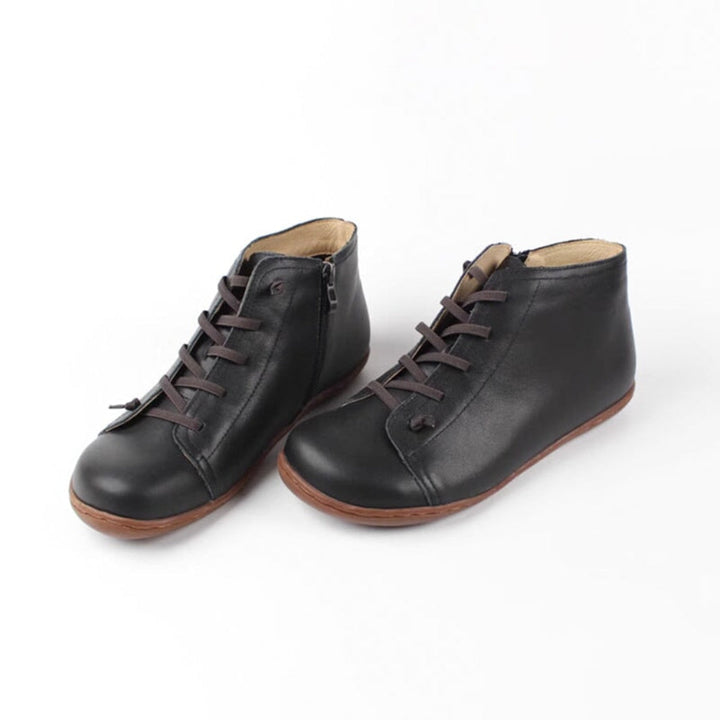 https://cdn.shopify.com/s/files/1/1014/6666/9387/files/dwarves389-34-boots-55-black-264178.jpg?v=1769454710